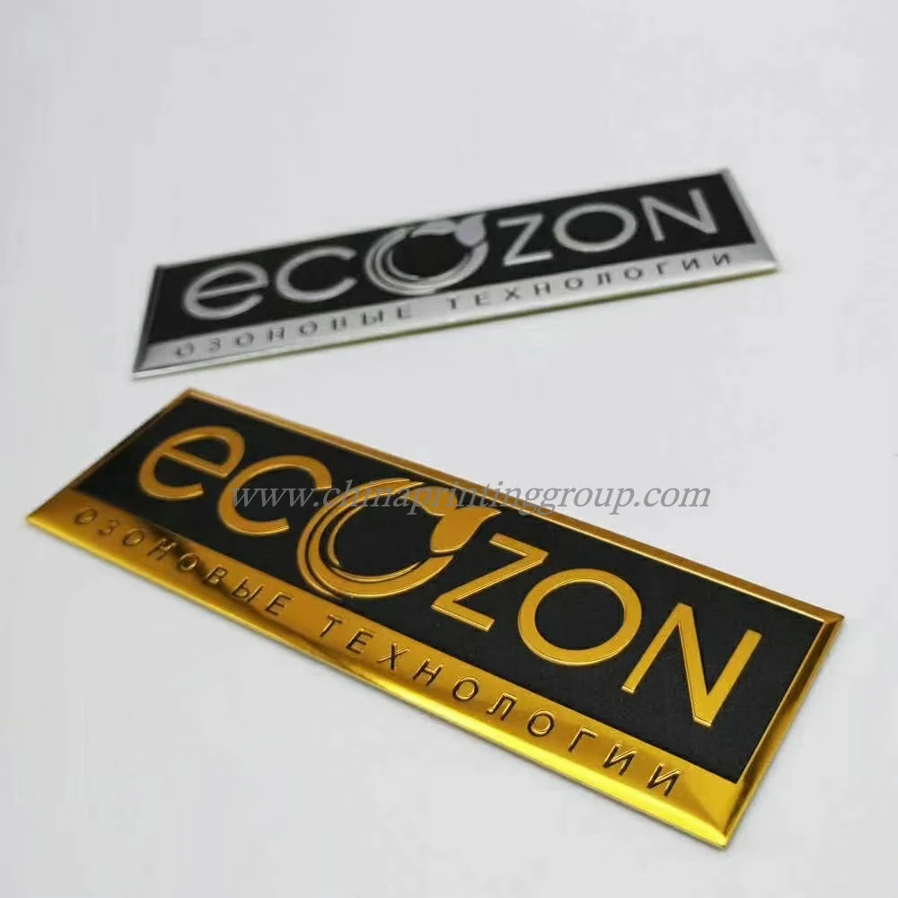 Close view of embossed metal label showing raised detail