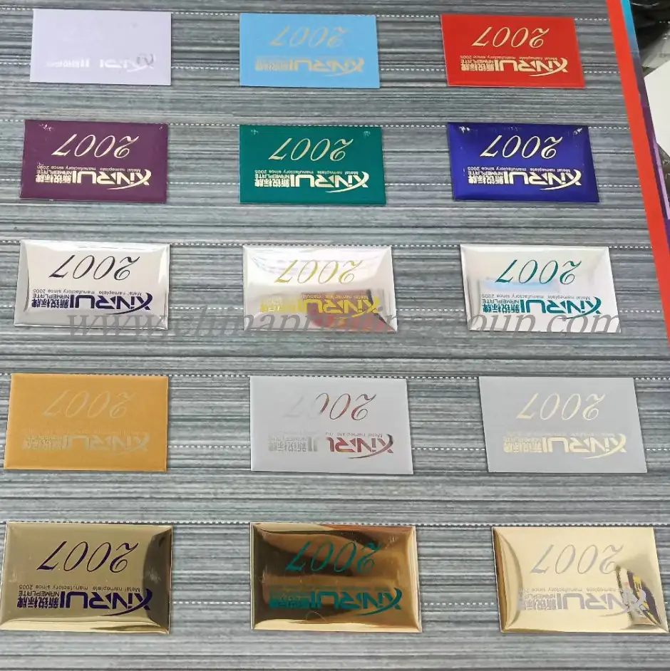 Promotional relief engraved and printed enamel metal labels