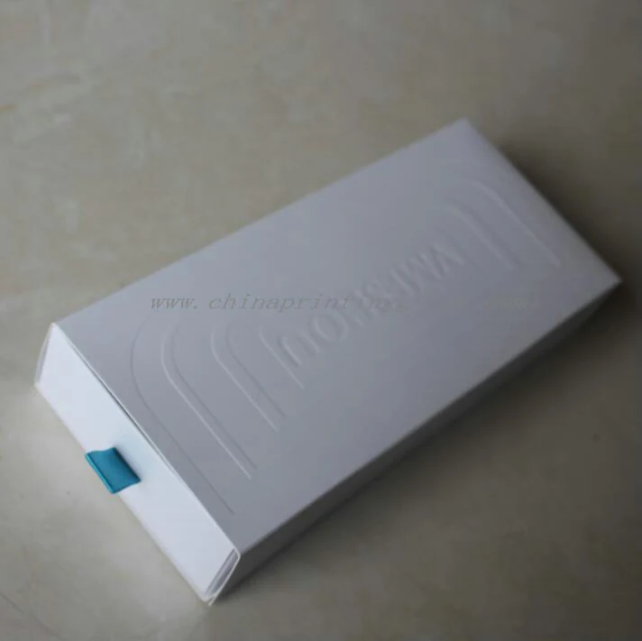 Printed cardboard suitcase gift box shown closed with handle upright
