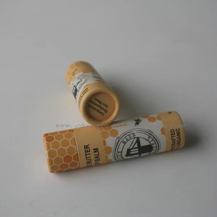 Close view of hot stamped logo on a paperboard lip balm tube