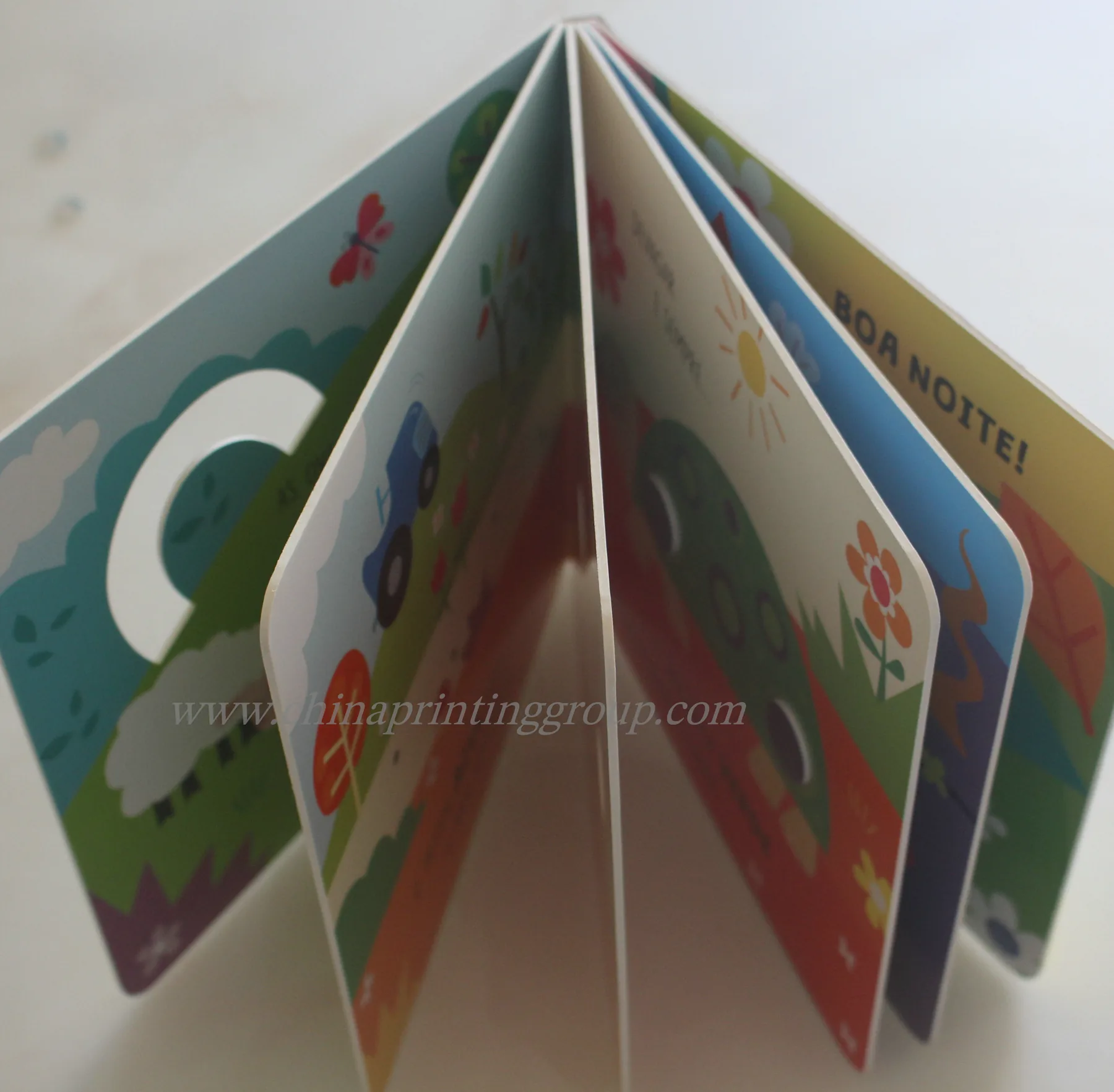 Children's cardboard book with ribbon marker accessory
