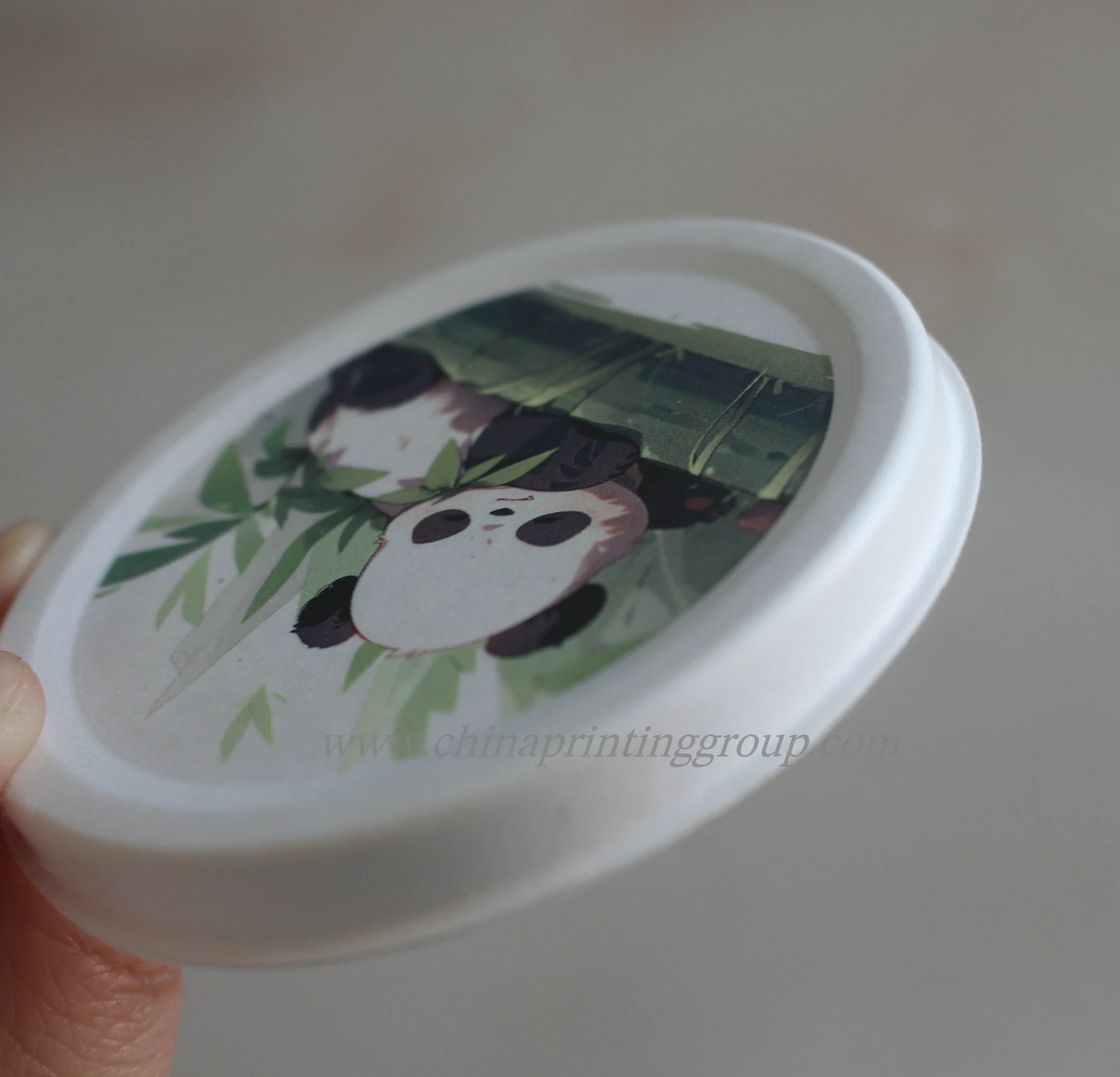 Biodegradable pulp packaging box holding a cosmetic bottle