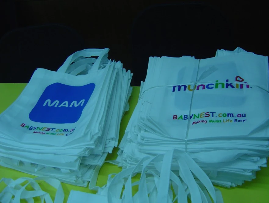 PP woven bag with laminated printed face and carry handles