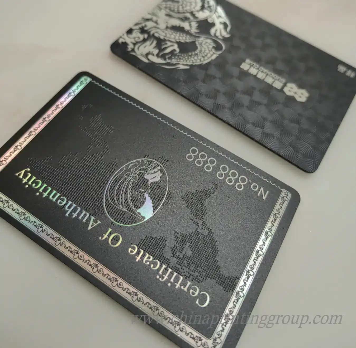 Set of custom plastic business cards laid out in credit card size