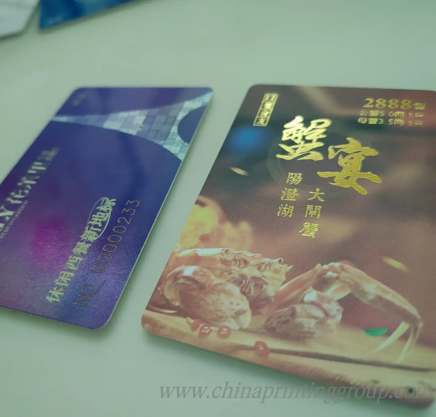 Stack of PVC business cards showing rounded corners and card thickness