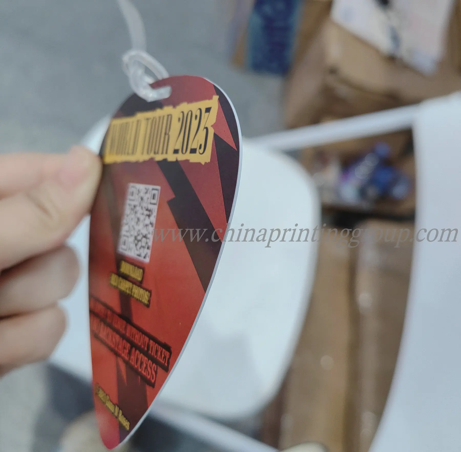 PVC luggage tag fitted with a plastic loop strap