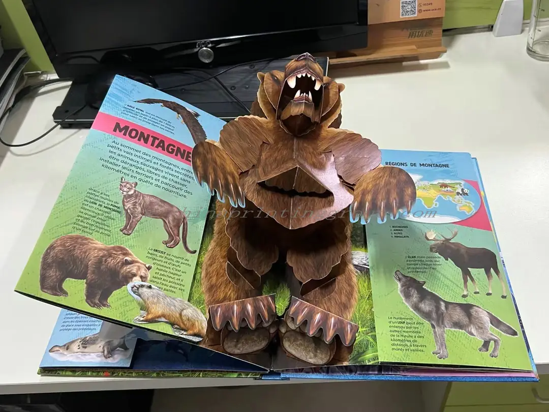Close view of hand assembled pop up paper mechanism in a kids book