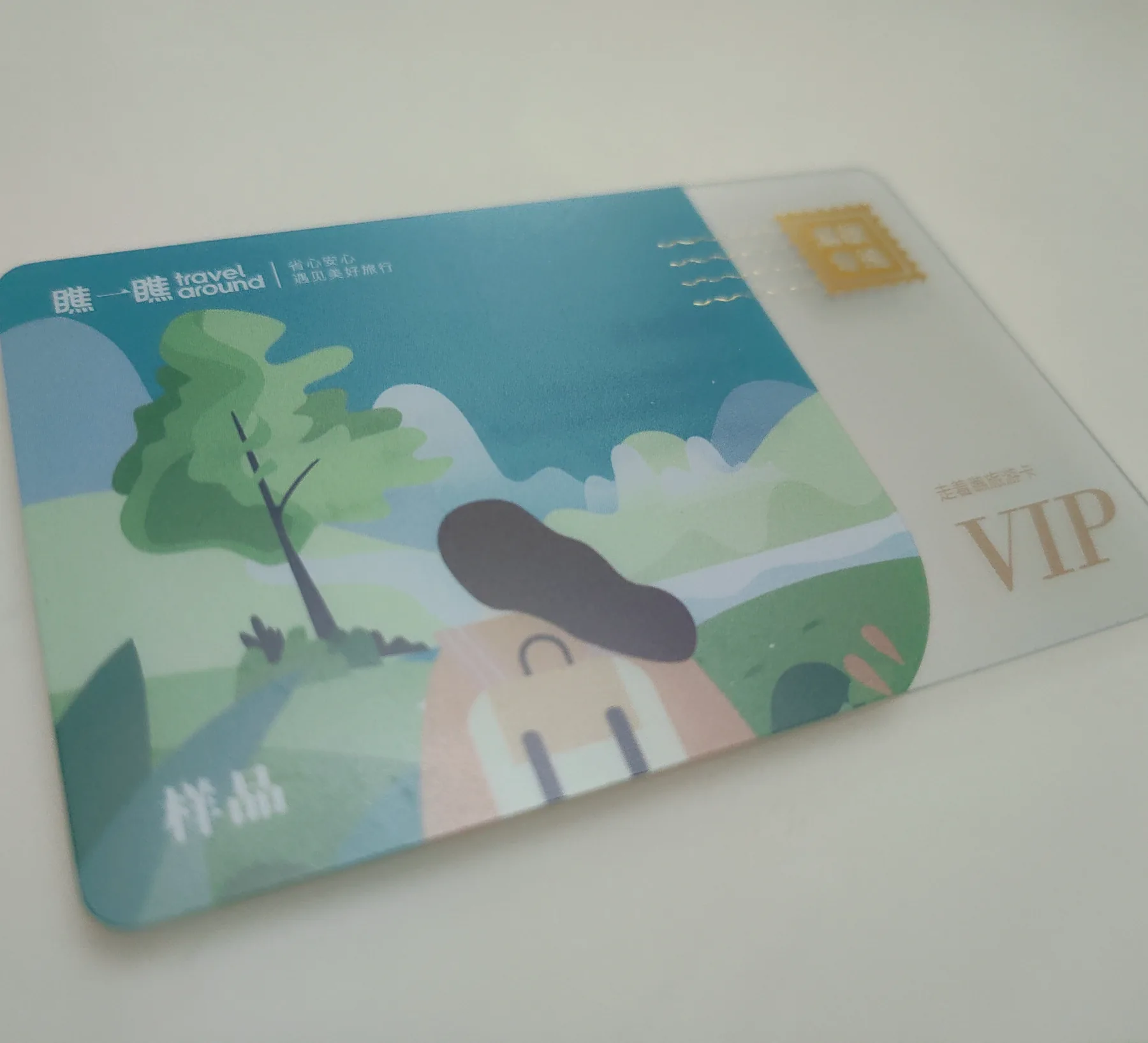 Close view of embossed detail and spot UV on a PVC card