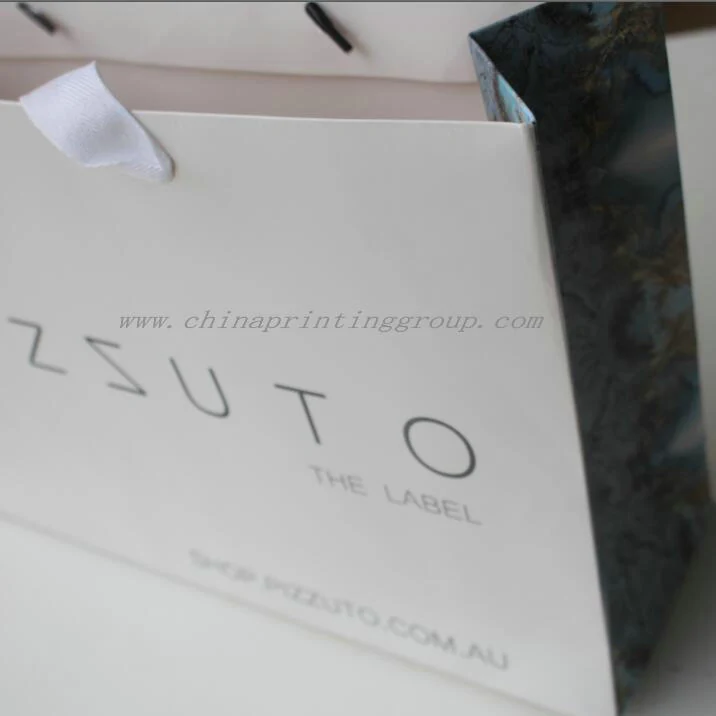 Several printed gift bag designs arranged together