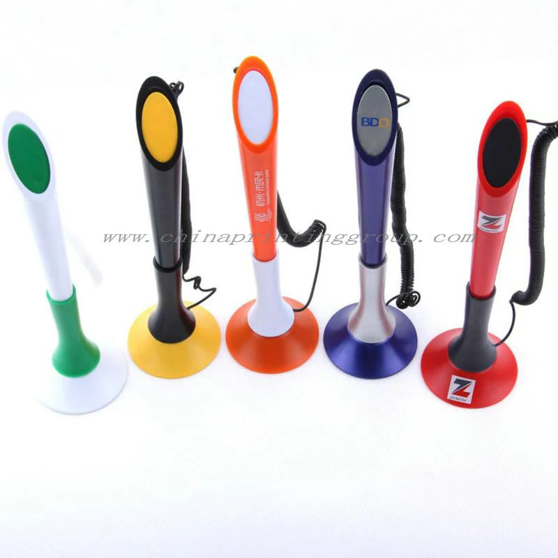 Several desk counter pen sets in different colours