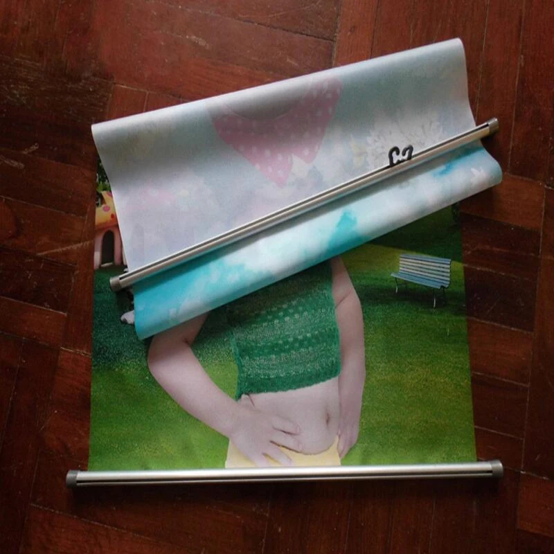Row of roll up banner stands set up at an exhibition