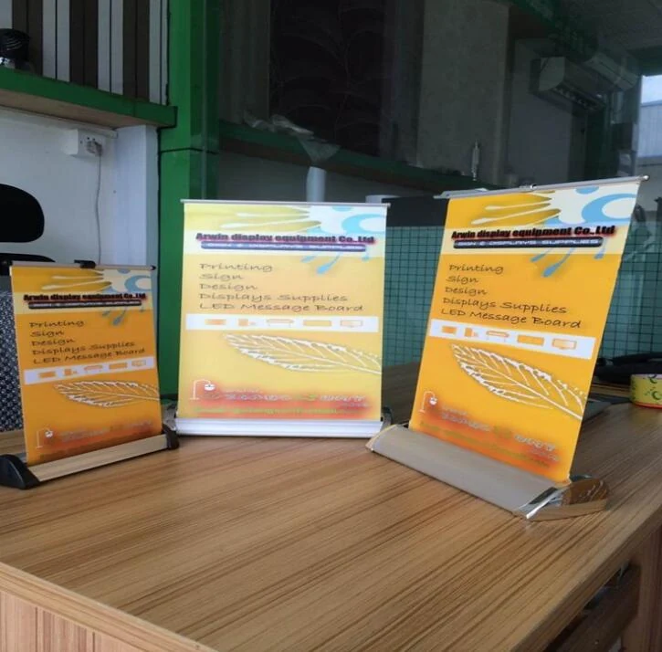 Small roll up banner stand shown on a counter top