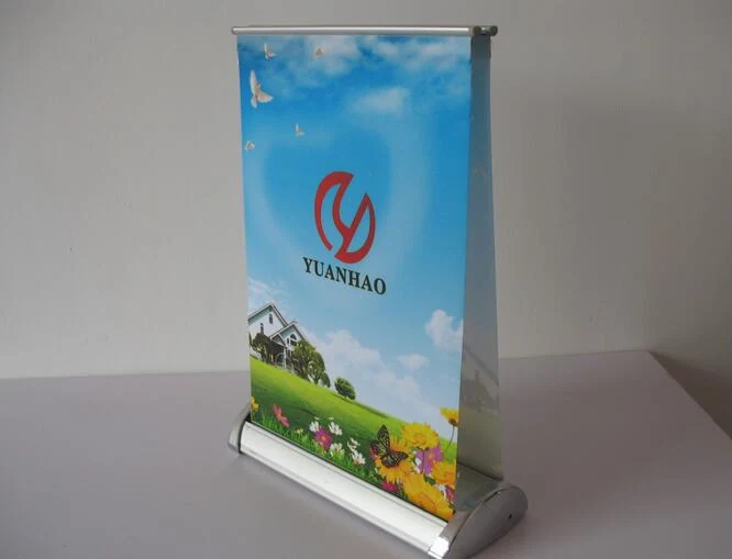 Double sided A4 roll up banner stand showing both printed faces