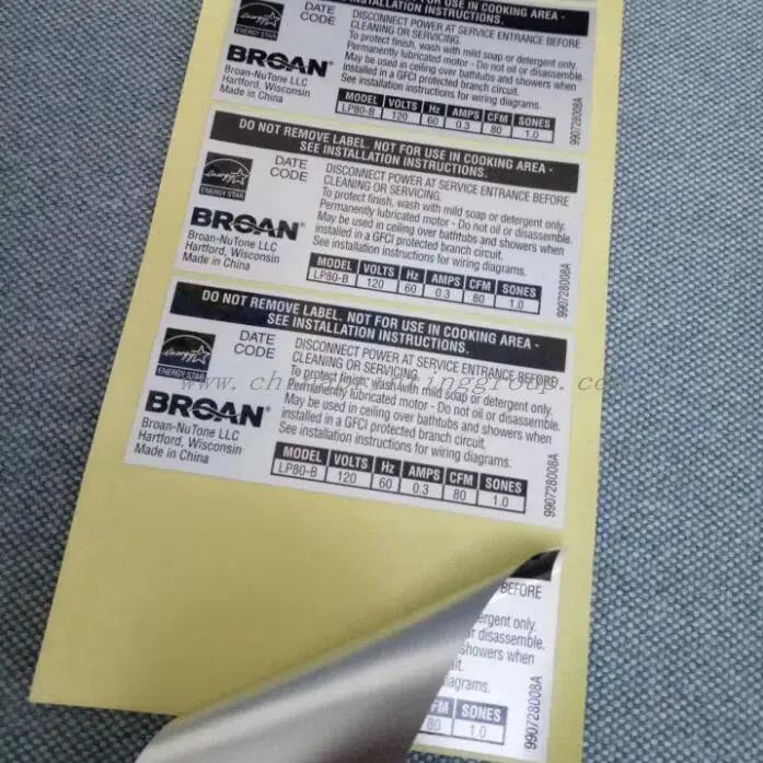 Close view of matte silver vinyl sticker surface and printed detail