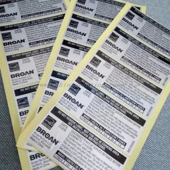 Foil stamped silver labels showing fine line artwork detail