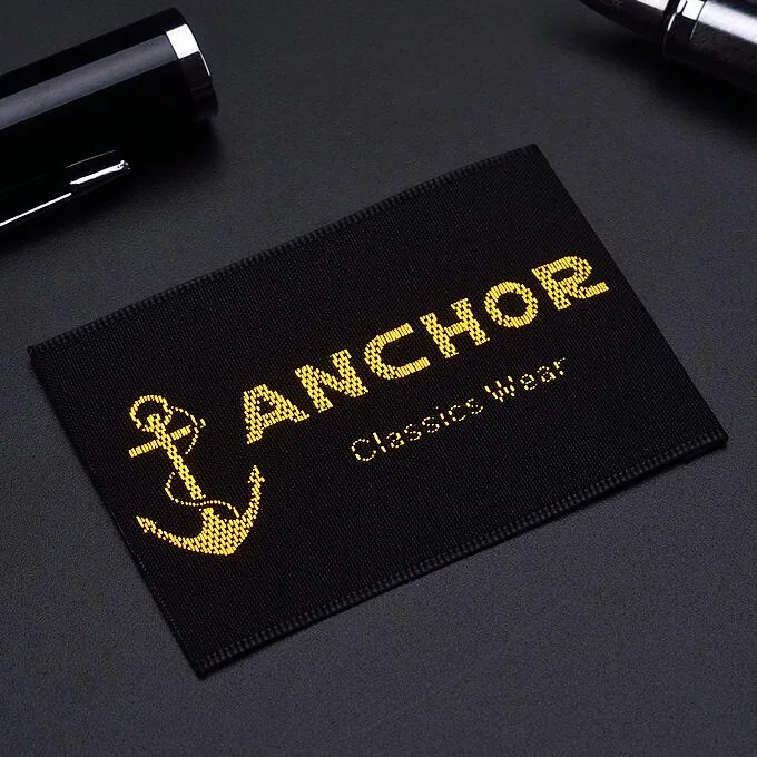 Embroidered clothing label showing raised thread detail
