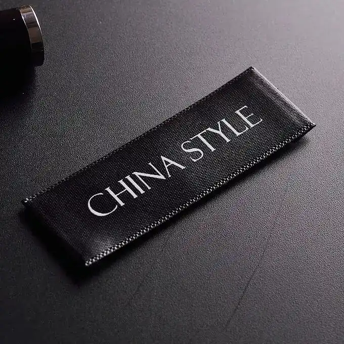 Custom embroidered labels applied to a bag