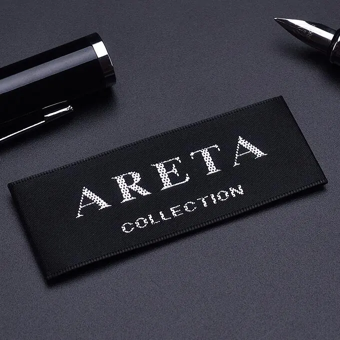 Wholesale black woven labels with custom embroidered logos