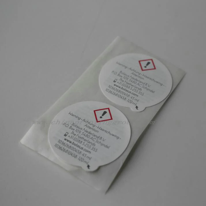 Accordion fold peel off label opened to show inner pages