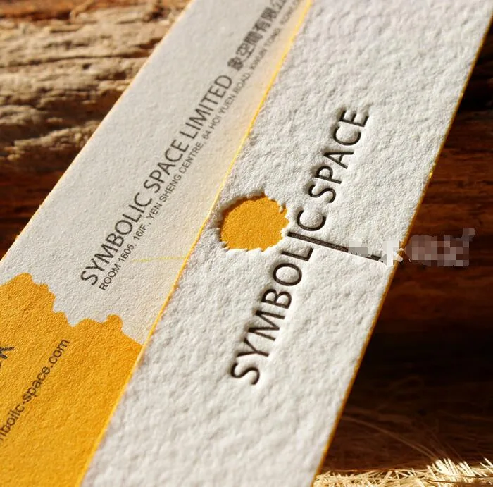 Stack of thick business cards showing card edge colour