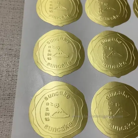 Blind embossed business logo stickers on paper