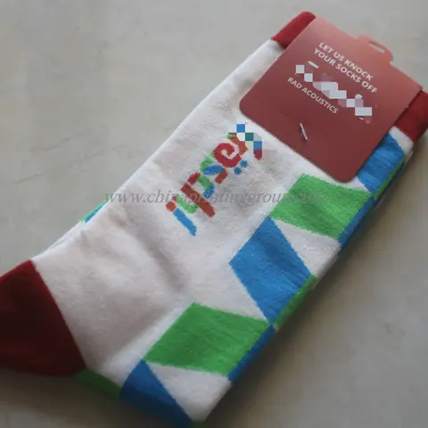 Custom athletic crew socks with knitted brand logo on the cuff
