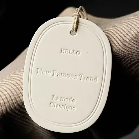 Custom garment swing tags printed with brand logo and hang string