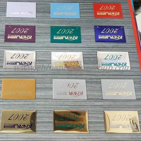 Promotional relief engraved and printed enamel metal labels