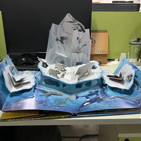 3D pop up book for kids opened to show a raised paper scene
