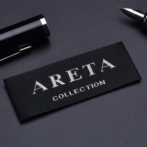 Wholesale black woven labels with custom embroidered logos