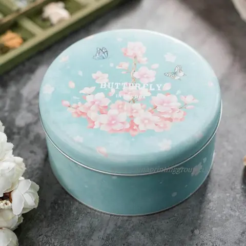 Custom printed round metal tin boxes in CMYK colour