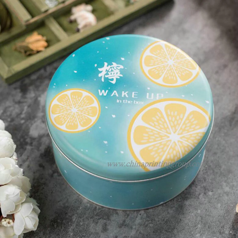 Small hinged candy tin box open to show the interior