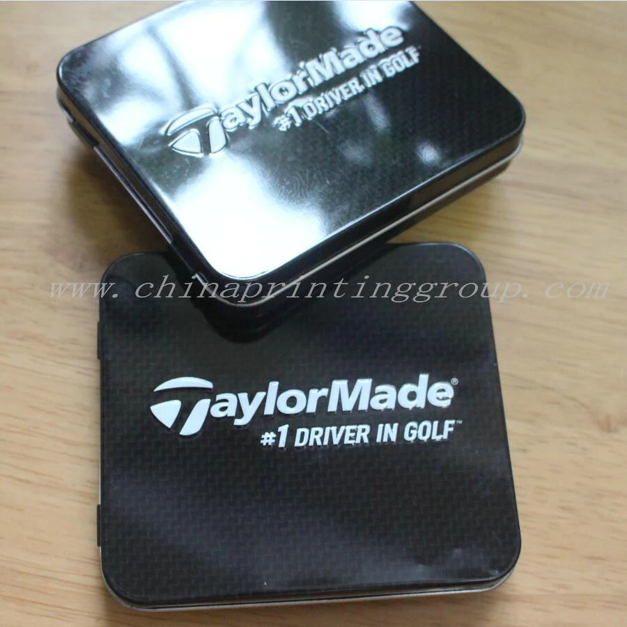 Hinged lid tin box open to show the inner coating