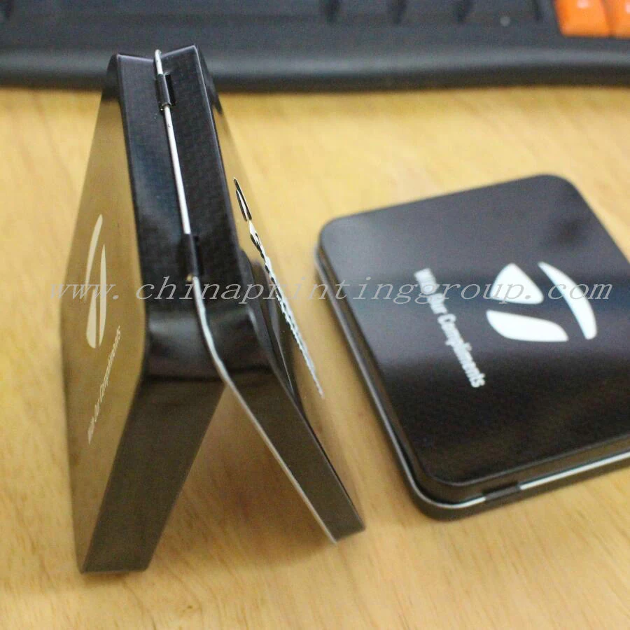 Assorted custom tin cases in silver black and gold