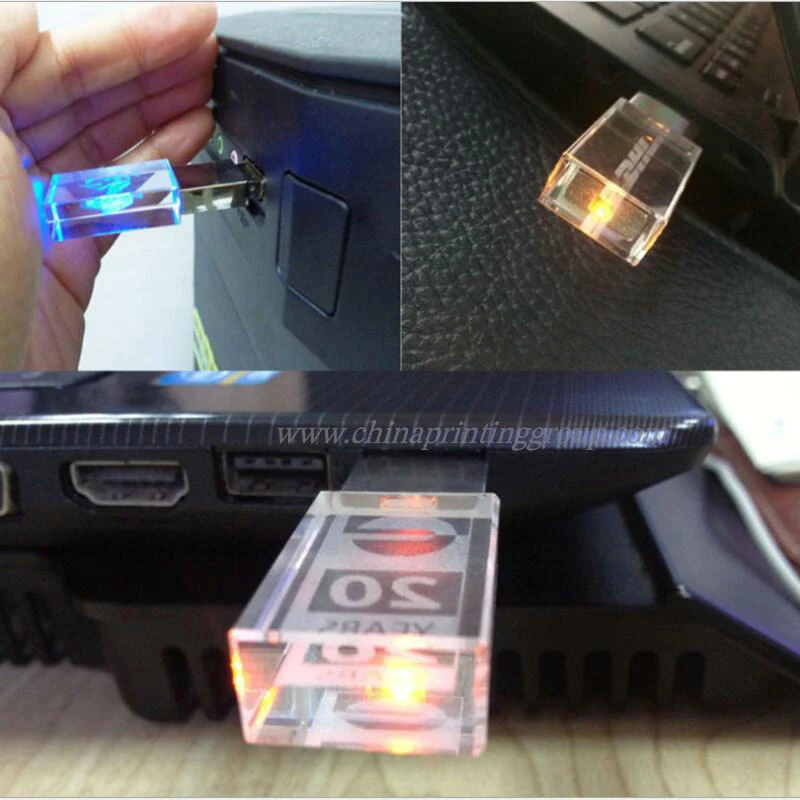 Close view of 3D engraved logo inside a glass USB drive body
