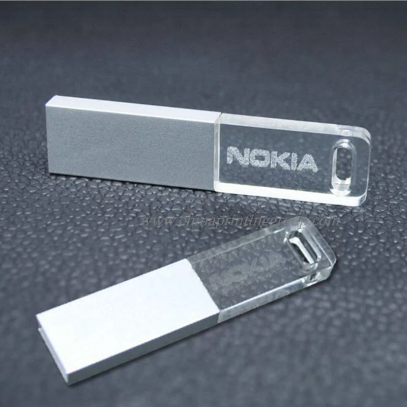 Crystal USB drive shown plugged into a laptop port