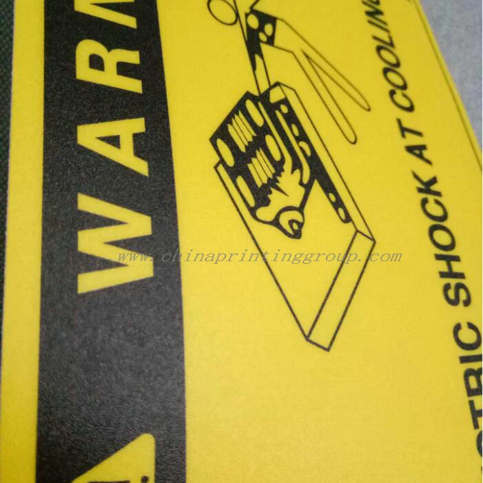 Matte frosted vinyl label applied to an electronic device housing