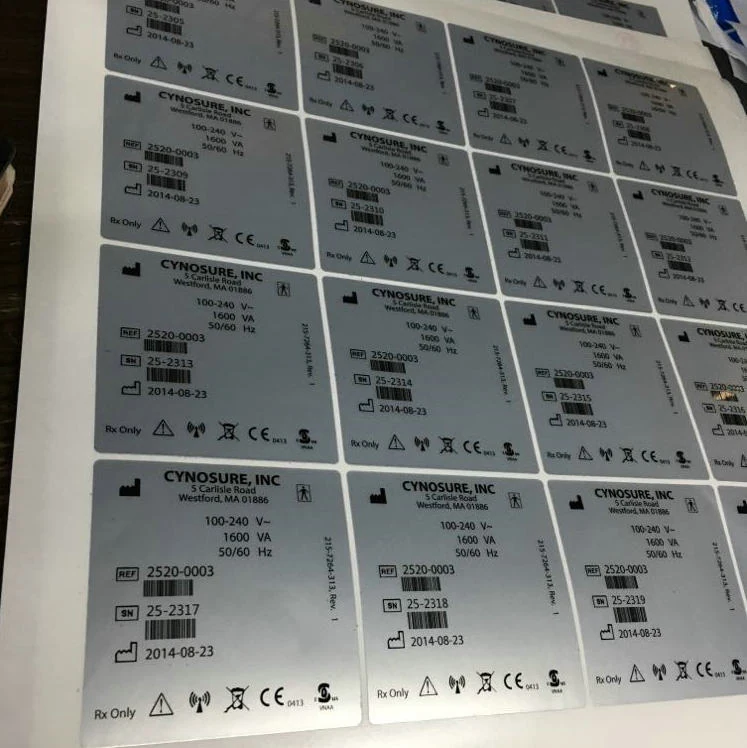 Silver foil serial number stickers applied to an electronic product