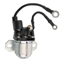 Metal cylindrical solenoid with mounting flange, black plastic top and wire leads with ring terminals, on white background