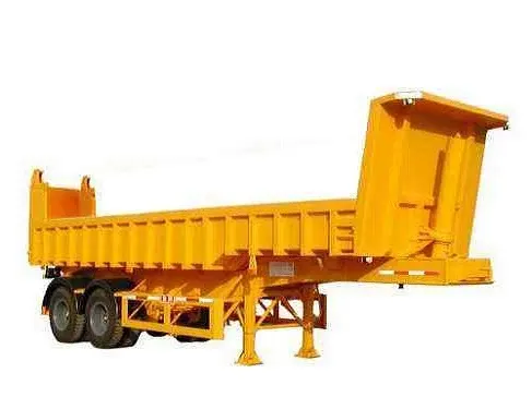 Side view of the trailer showing leaf spring suspension and 1200R20 tyres