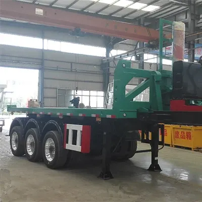 2-axle rear dumper semi trailer parked on a yard, front three-quarter view showing dump cylinder and front axle