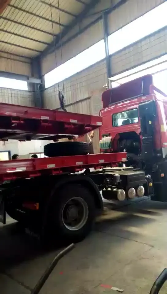 Side view of a 3-axle lowbed semi trailer with 12R22.5 tyres and leaf spring suspension