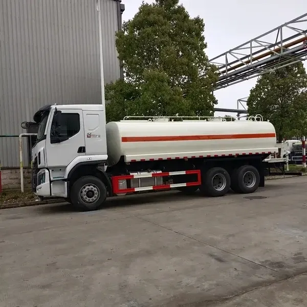 White SINOTRUK HOWO 4x2 light truck chassis parked on a yard, front three-quarter view