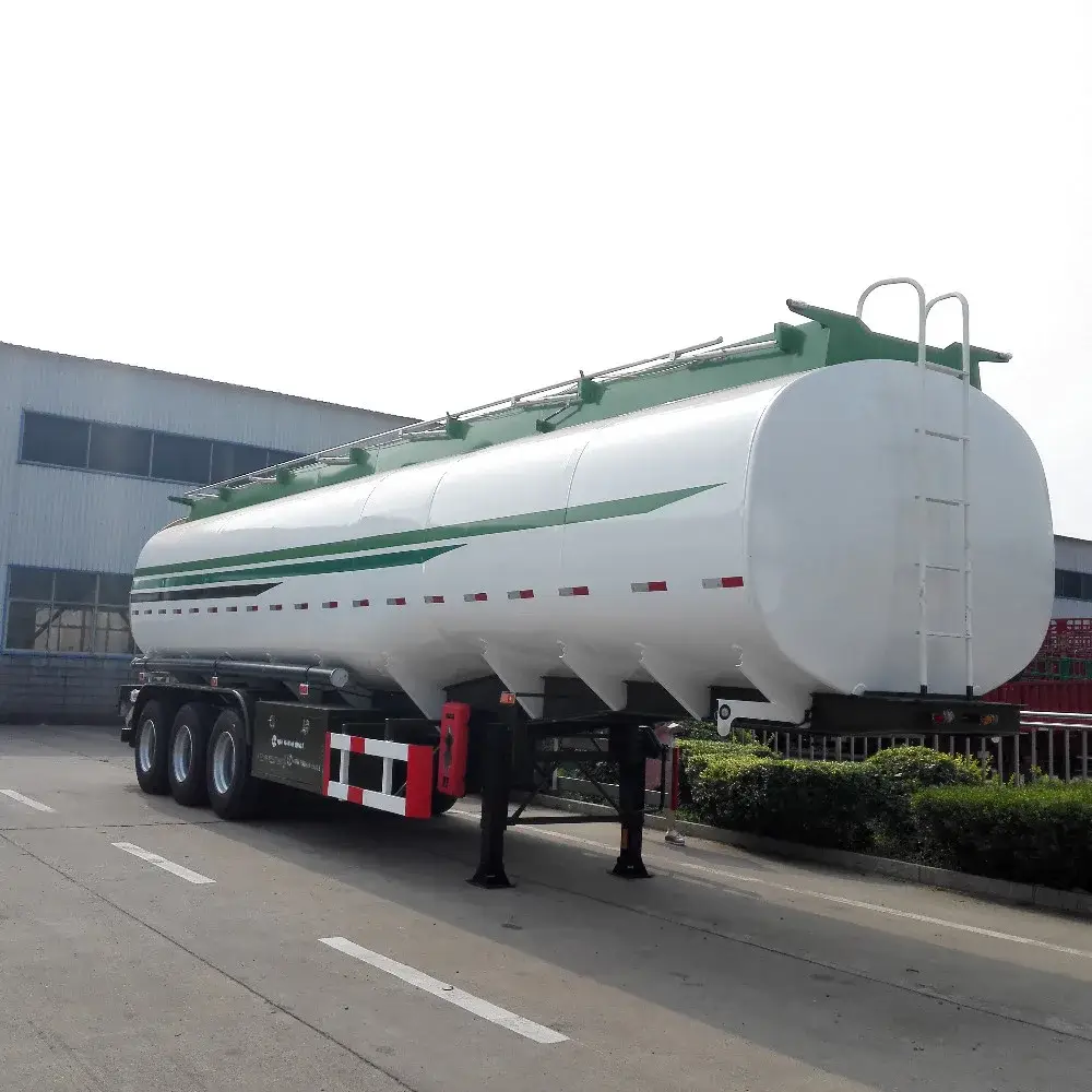 White 70000L fuel tanker trailer parked on a yard