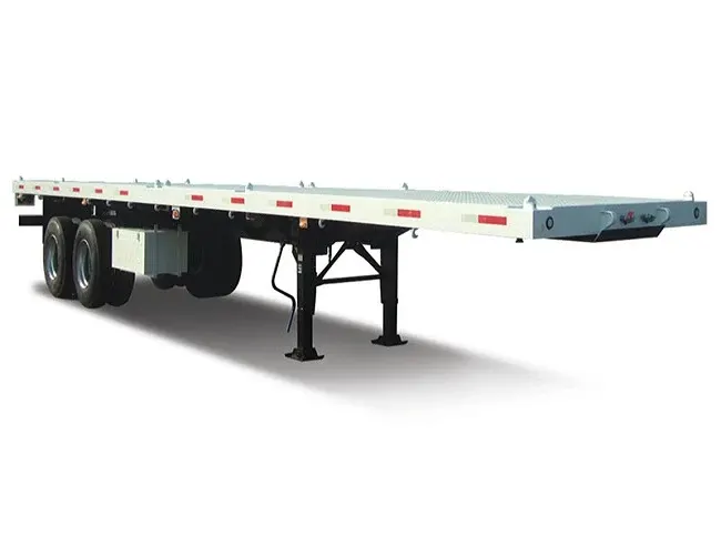 Side view of a 40ft flatbed trailer with 3 axles, white body, and 12R22.5 tyres