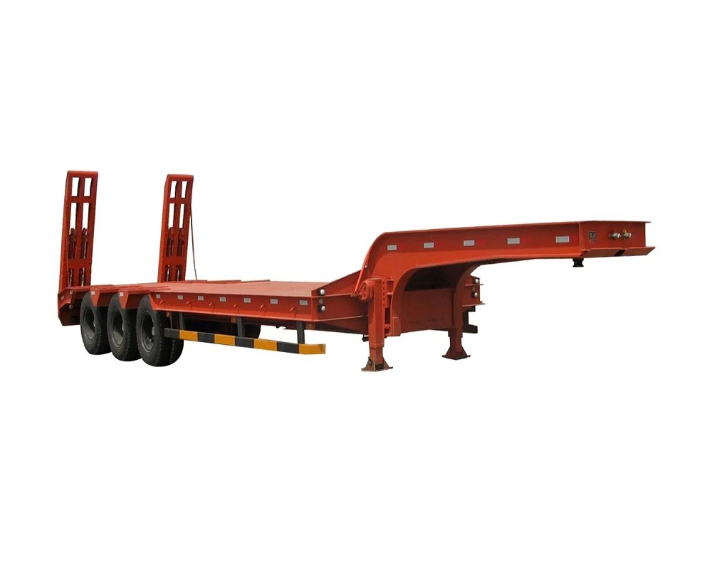 Red flatbed trailer with dual axles and rear ramps.