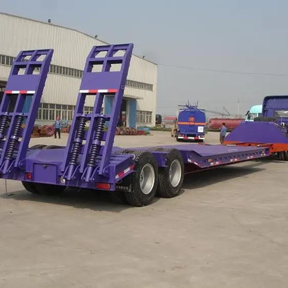 Side view of a 3-axle low bed semi trailer with 1200R20 tyres and leaf spring suspension