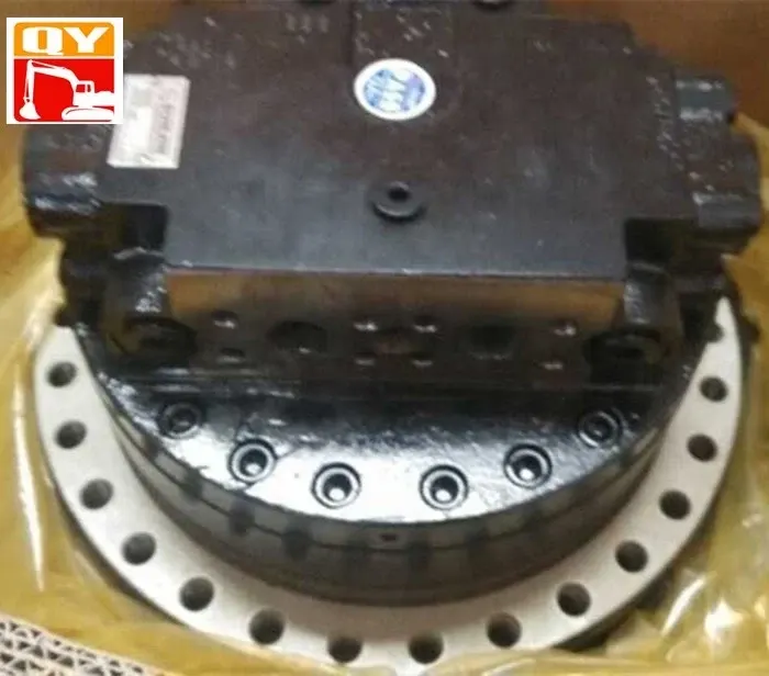 TM40 travel motor and final drive unit mounted on a test rig, showing gear housing and oil ports