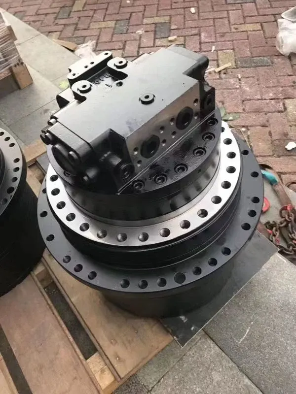 Close-up of PC400-7 excavator final drive 706-8J-01012 with steel housing and hydraulic fittings