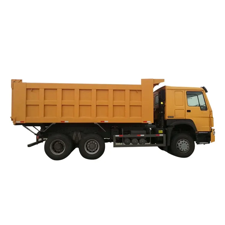 Front three-quarter view of a white 6x4 dump truck with MAN F3000 cab and 12.00R20 tyres
